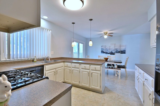1340 Charger Ct, Carol Stream, IL 60188 - kitchen featuring ceiling fan, cooktop, white cabinets, pendant lighting, and dishwasher
