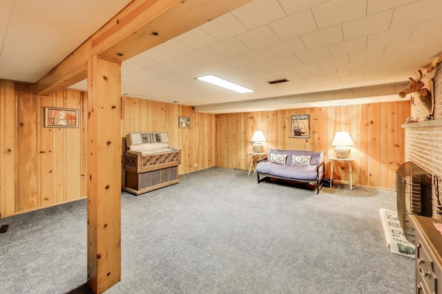 222 Cornell Ave, Des Plaines, IL 60016 - carpeted bedroom with wooden walls and a fireplace