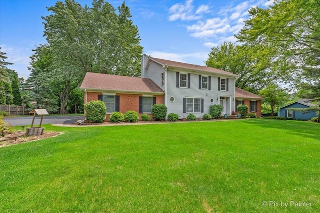 2N445 Beith Rd, Elburn, IL 60119 - colonial house with a front yard, a chimney, and brick siding