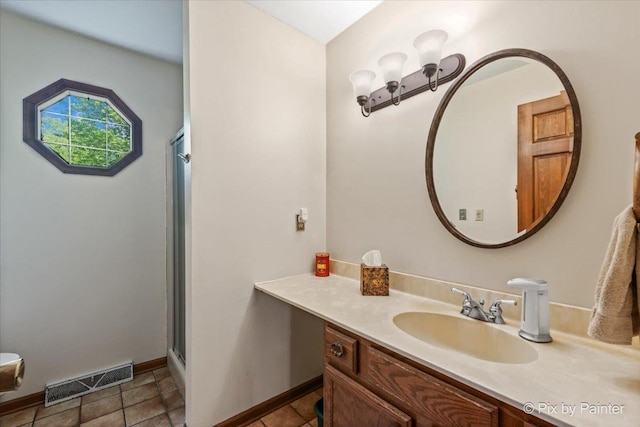 2N445 Beith Rd, Elburn, IL 60119 - bathroom with vanity, a shower with shower door, and tile patterned floors