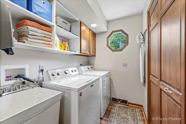 2N445 Beith Rd, Elburn, IL 60119 - washroom with cabinet space, wood finished floors, and independent washer and dryer