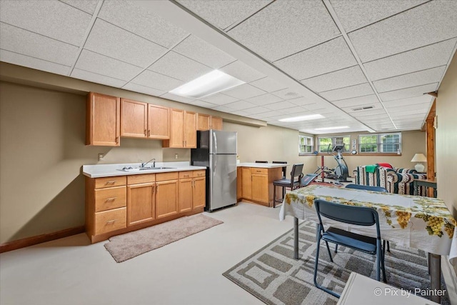 2N445 Beith Rd, Elburn, IL 60119 - kitchen with freestanding refrigerator, light countertops, and a paneled ceiling