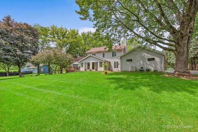 2N445 Beith Rd, Elburn, IL 60119 - back of property with a yard and a chimney