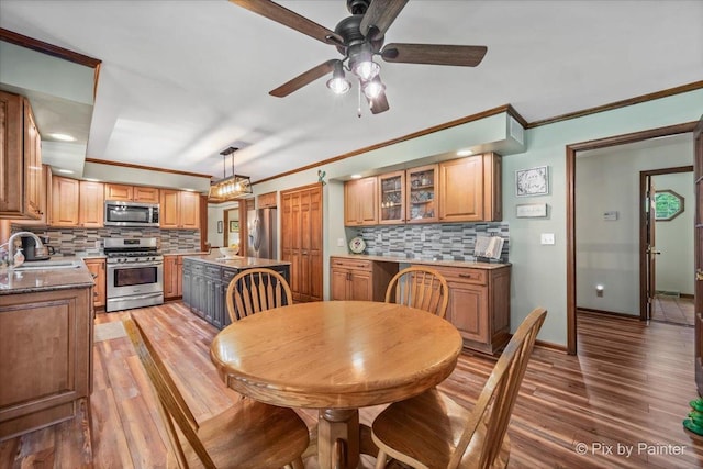 2N445 Beith Rd, Elburn, IL 60119 - dining space with ceiling fan, light wood finished floors, and ornamental molding