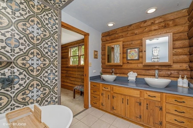 N1508 Wildwood Rd, Linn, WI 53147 - full bathroom with log walls, double vanity, and tile patterned floors