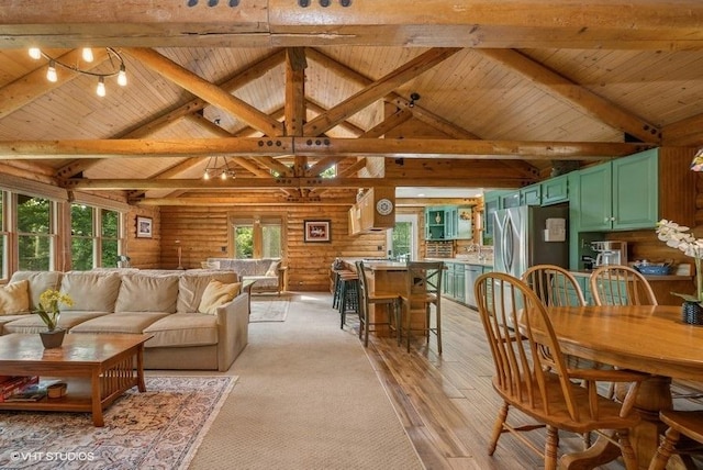 N1508 Wildwood Rd, Linn, WI 53147 - living area with a wood ceiling with exposed beams, light wood-type flooring, rustic walls, and high vaulted ceiling