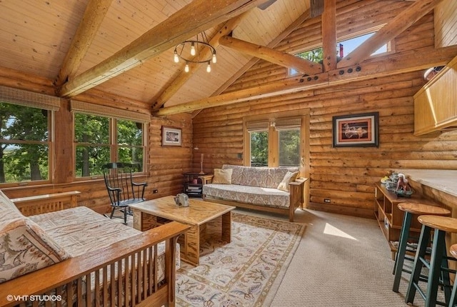 N1508 Wildwood Rd, Linn, WI 53147 - living room featuring a wooden ceiling with exposed beams, high vaulted ceiling, rustic walls, and carpet flooring