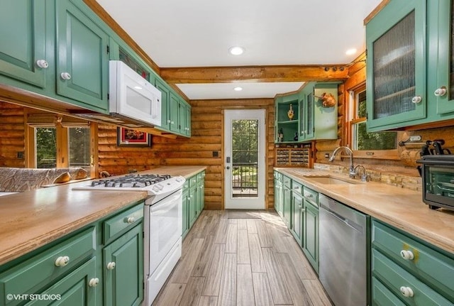 N1508 Wildwood Rd, Linn, WI 53147 - kitchen featuring white appliances, log walls, green cabinets, light countertops, and wood tiled floors