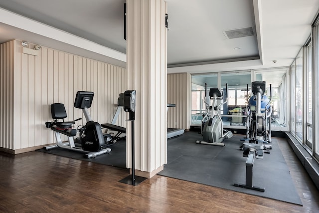 201 E Chestnut St Unit 21F, Chicago, IL 60611 - exercise room with plenty of natural light and wood finished floors