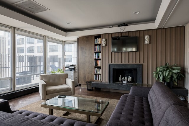 201 E Chestnut St Unit 21F, Chicago, IL 60611 - living area with a fireplace with raised hearth