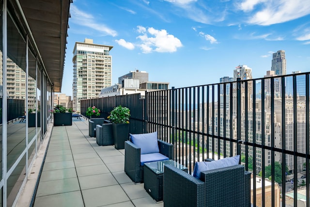 201 E Chestnut St Unit 21F, Chicago, IL 60611 - patio / terrace featuring a city view