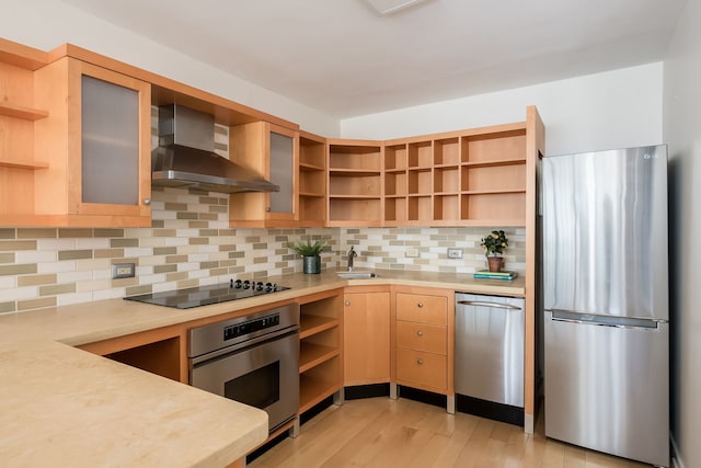201 E Chestnut St Unit 21F, Chicago, IL 60611 - kitchen featuring open shelves, appliances with stainless steel finishes, wall chimney range hood, light countertops, and light wood-type flooring