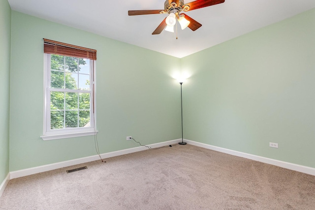 31 E Shagbark Ln, Streamwood, IL 60107 - empty room with light colored carpet and ceiling fan