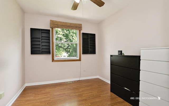 21136 W Engle Dr, Lake Villa, IL 60046 - unfurnished bedroom with wood finished floors and ceiling fan