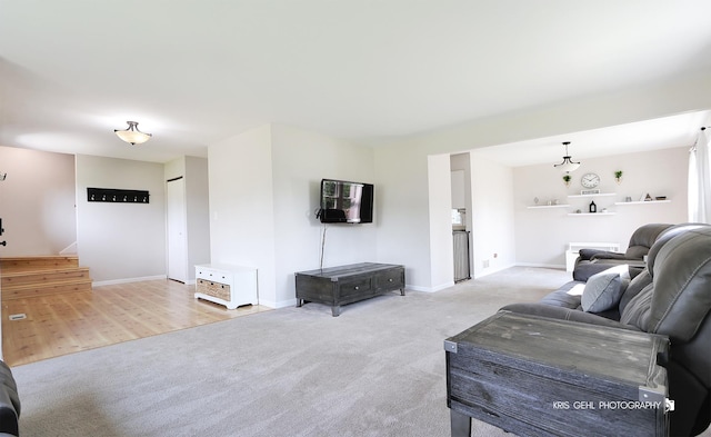 21136 W Engle Dr, Lake Villa, IL 60046 - carpeted living room with stairs and baseboards