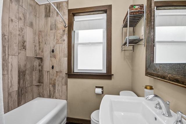 7439 N Maplewood Ave, Chicago, IL 60645 - bathroom with a sink and tub / shower combination
