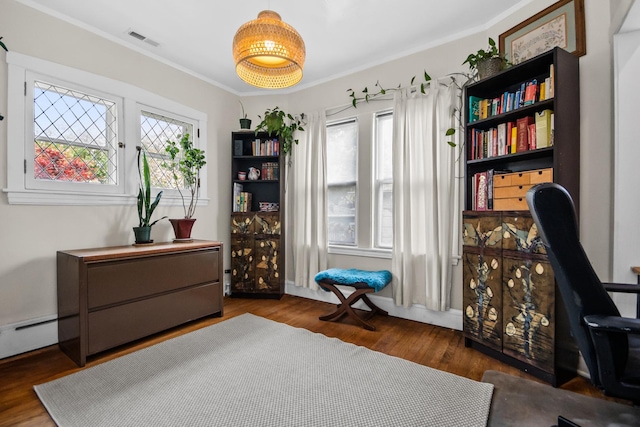 7439 N Maplewood Ave, Chicago, IL 60645 - office featuring ornamental molding, wood finished floors, and baseboard heating