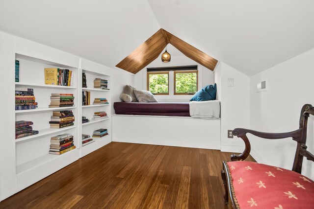 7439 N Maplewood Ave, Chicago, IL 60645 - bedroom featuring wood finished floors and lofted ceiling