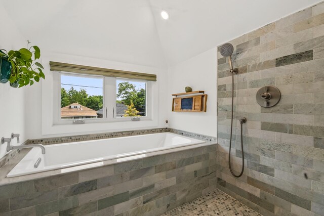 7439 N Maplewood Ave, Chicago, IL 60645 - full bathroom featuring a bath, a tile shower, and lofted ceiling