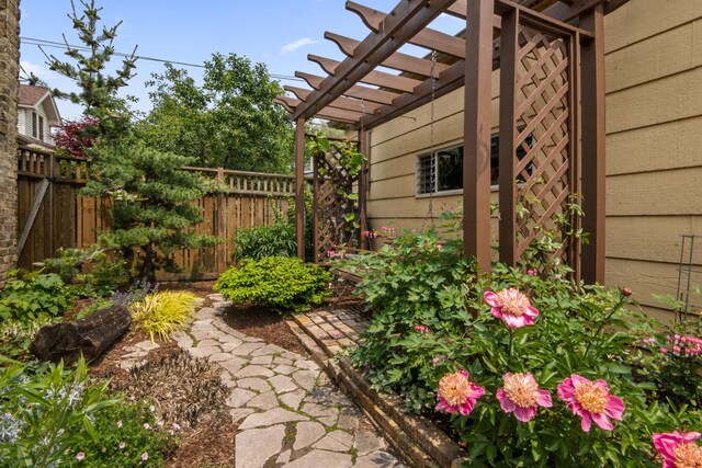 7439 N Maplewood Ave, Chicago, IL 60645 - view of yard with a pergola