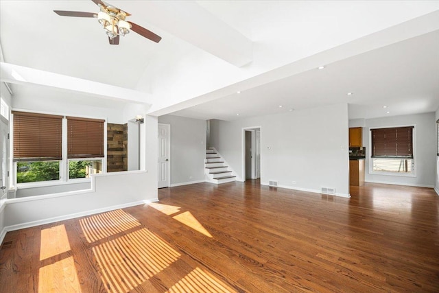 145 N Oakleaf Dr, Addison, IL 60101 - unfurnished living room featuring a ceiling fan, wood finished floors, stairs, and recessed lighting