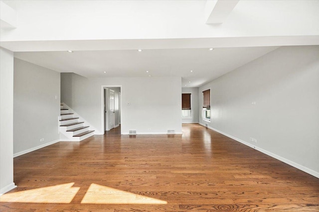 145 N Oakleaf Dr, Addison, IL 60101 - empty room featuring wood finished floors, stairs, and recessed lighting