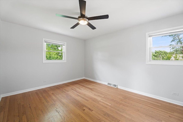145 N Oakleaf Dr, Addison, IL 60101 - empty room featuring ceiling fan and light wood-style floors