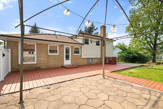 145 N Oakleaf Dr, Addison, IL 60101 - rear view of house with brick siding, a wooden deck, and a patio area