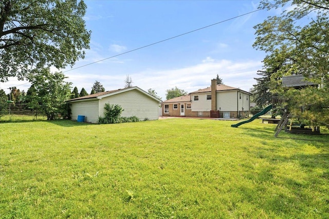 145 N Oakleaf Dr, Addison, IL 60101 - view of yard with a playground