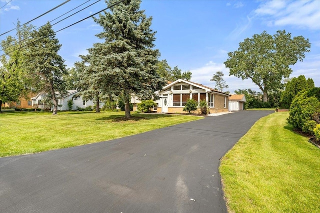 145 N Oakleaf Dr, Addison, IL 60101 - view of front of property with a front lawn