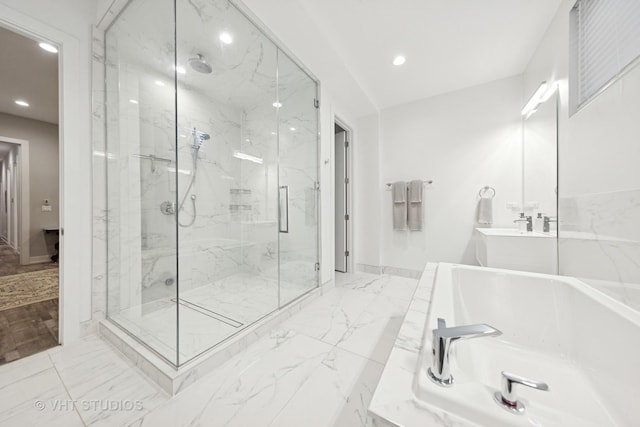 5236 N Kenmore Ave Unit 1N, Chicago, IL 60640 - bathroom with a marble finish shower, recessed lighting, a garden tub, vanity, and marble finish flooring