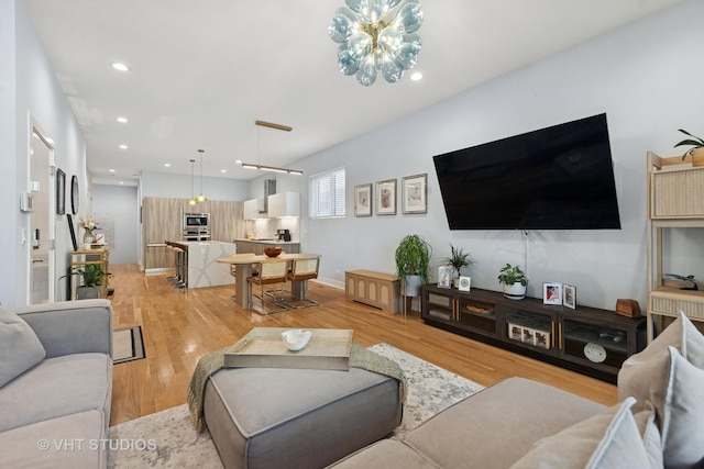 5236 N Kenmore Ave Unit 1N, Chicago, IL 60640 - living area with light wood finished floors and recessed lighting