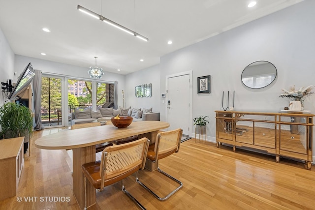 5236 N Kenmore Ave Unit 1N, Chicago, IL 60640 - dining space featuring light wood-type flooring, recessed lighting, and a chandelier