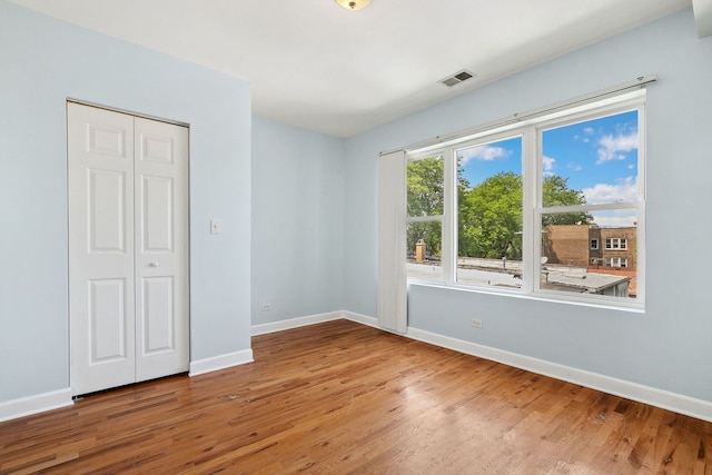 2554 W Rosemont Ave Unit 3, Chicago, IL 60659 - unfurnished room featuring wood finished floors