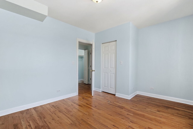 2554 W Rosemont Ave Unit 3, Chicago, IL 60659 - unfurnished room with light wood-style flooring