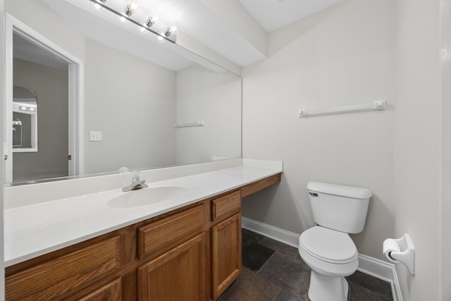 905 Huntington Dr, Elk Grove Village, IL 60007 - bathroom featuring vanity and stone finish flooring