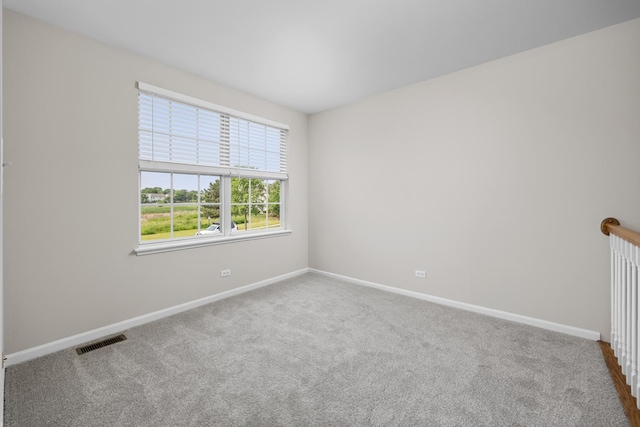 905 Huntington Dr, Elk Grove Village, IL 60007 - unfurnished room featuring baseboards and carpet flooring