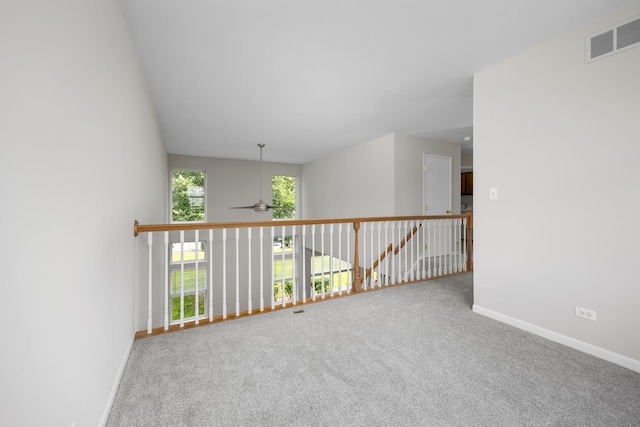 905 Huntington Dr, Elk Grove Village, IL 60007 - carpeted empty room featuring a ceiling fan and baseboards
