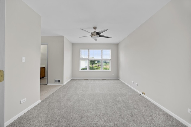 905 Huntington Dr, Elk Grove Village, IL 60007 - empty room featuring carpet flooring and ceiling fan