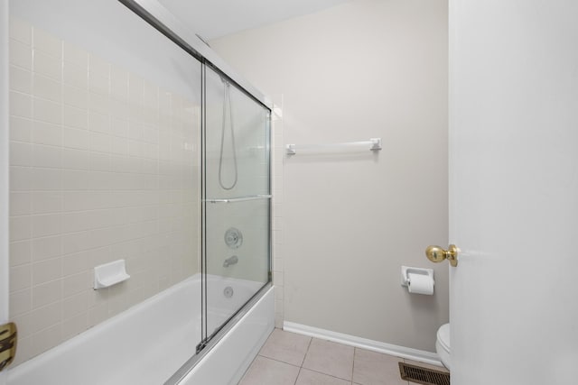 905 Huntington Dr, Elk Grove Village, IL 60007 - bathroom featuring tile patterned flooring and combined bath / shower with glass door