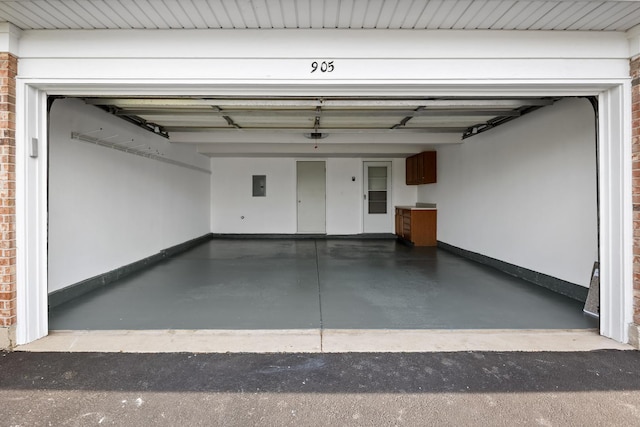 905 Huntington Dr, Elk Grove Village, IL 60007 - garage with baseboards and electric panel