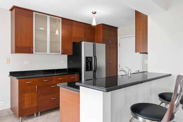 905 Huntington Dr, Elk Grove Village, IL 60007 - kitchen with stainless steel fridge, a peninsula, dark countertops, and glass insert cabinets