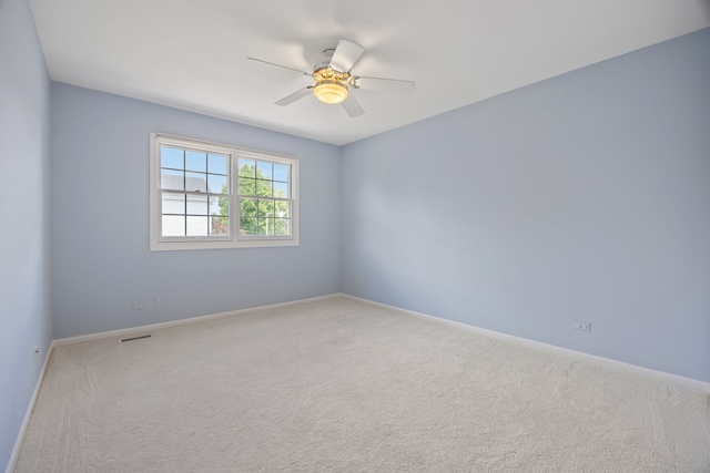 2319 Cloverdale Rd, Naperville, IL 60564 - carpeted spare room with a ceiling fan and baseboards