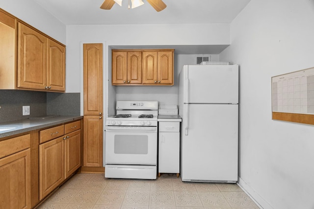 418 S Vail Ave, Arlington Heights, IL 60005 - kitchen with white appliances, a ceiling fan, brown cabinets, dark countertops, and light tile patterned floors