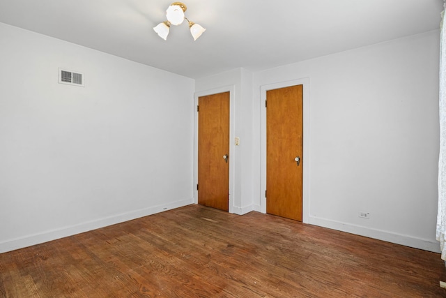 418 S Vail Ave, Arlington Heights, IL 60005 - unfurnished room with wood finished floors and baseboards
