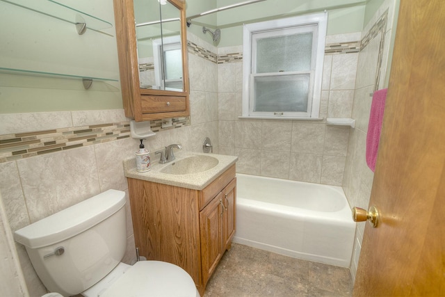 333 Elm St, Glen Ellyn, IL 60137 - bathroom featuring vanity, tile walls, and bathtub / shower combination