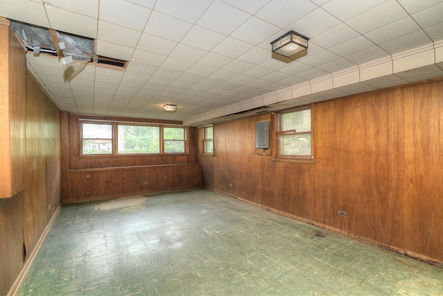 333 Elm St, Glen Ellyn, IL 60137 - unfurnished room featuring tile patterned floors, electric panel, and wood walls