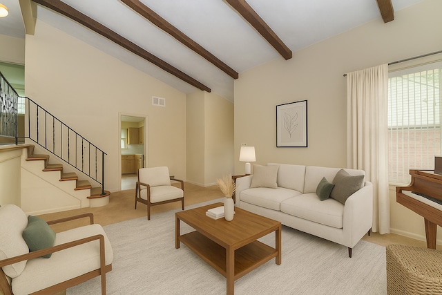 333 Elm St, Glen Ellyn, IL 60137 - living area with light colored carpet, beam ceiling, stairs, and high vaulted ceiling