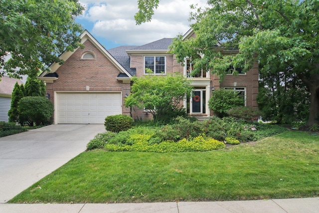 1560 Fairway Cir, Geneva, IL 60134 - traditional-style house featuring brick siding, concrete driveway, a garage, and a front yard