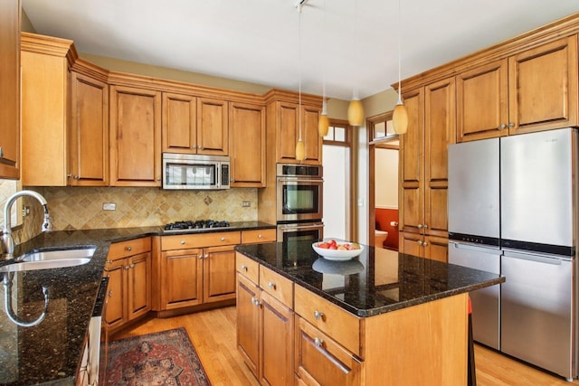 1560 Fairway Cir, Geneva, IL 60134 - kitchen with appliances with stainless steel finishes, light wood-type flooring, and brown cabinets